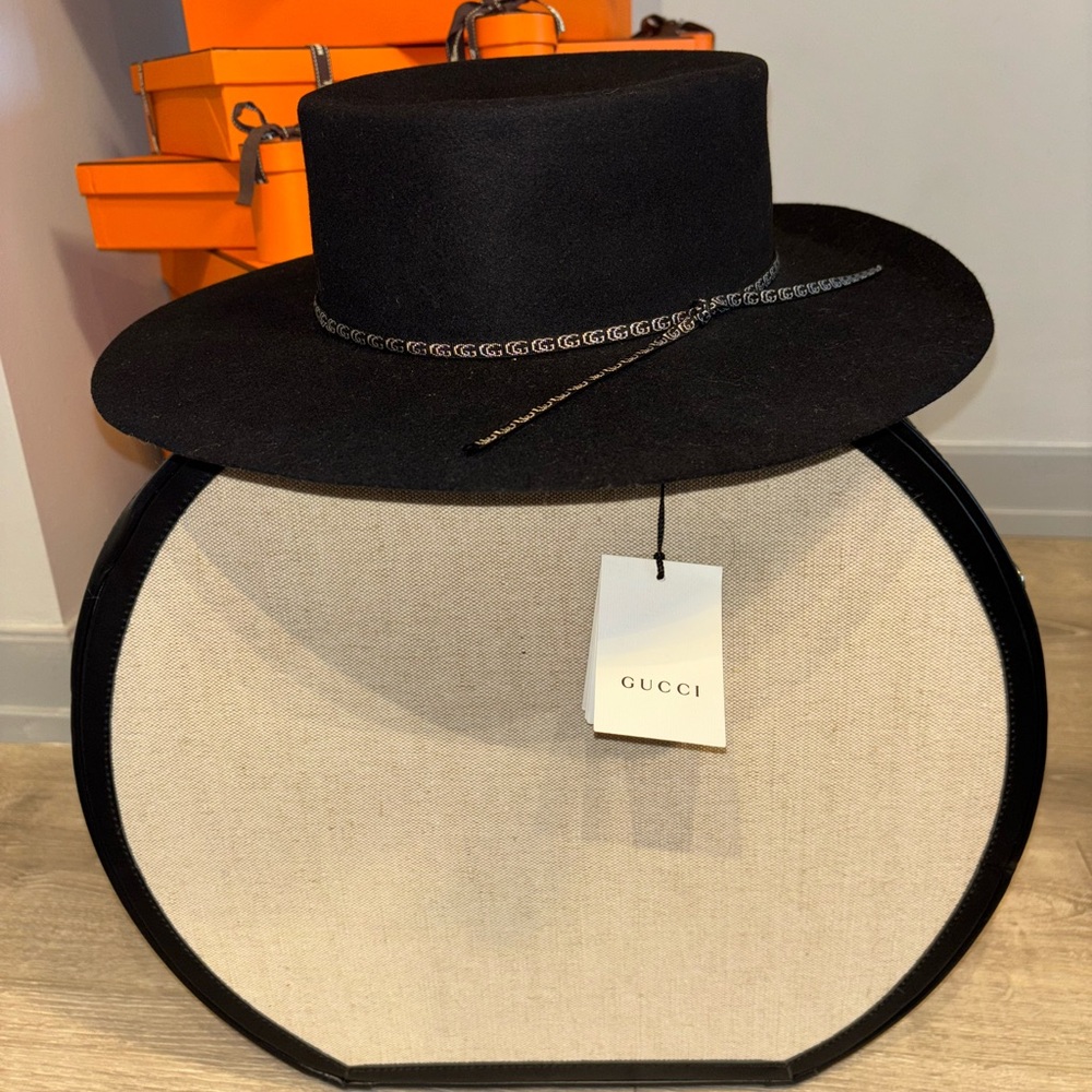 Gucci Elegant Black Hat with Chain Accent